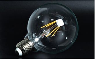 LED filamentlamp E27 rond 6W dimbaar warm wit transparant glas